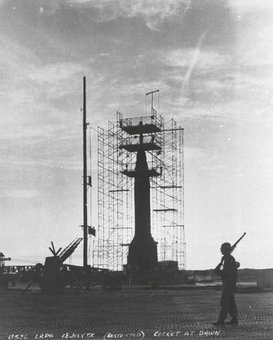 Bumper Launch Preparations At Cape Canaveral. Bumper WAC Rocket. Missile on pad with work stand in position. Rocket at dawn.